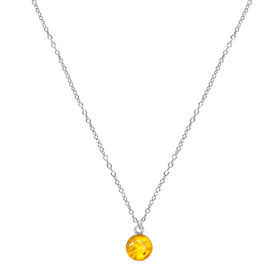 Close up of yellow Sarcoma cancer awareness necklace on sterling silver chain