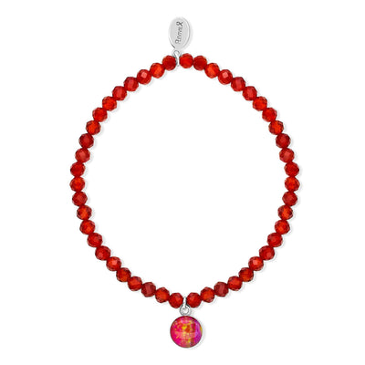 awareness stretch bracelet with red carnelian stones and small round sterling silver pendant with heart disease cell image under resin
