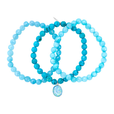Teal jade, aquamarine and blue turquoise stretch Alzheimer's awareness bracelet set with blue pendant in resin.
