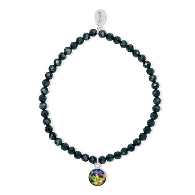Black Melanoma bracelet with multi-colored round pendant. 