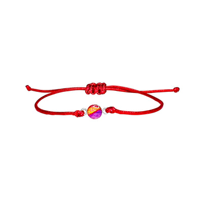 heart disease awareness bracelet with adjustable red cord that gives back