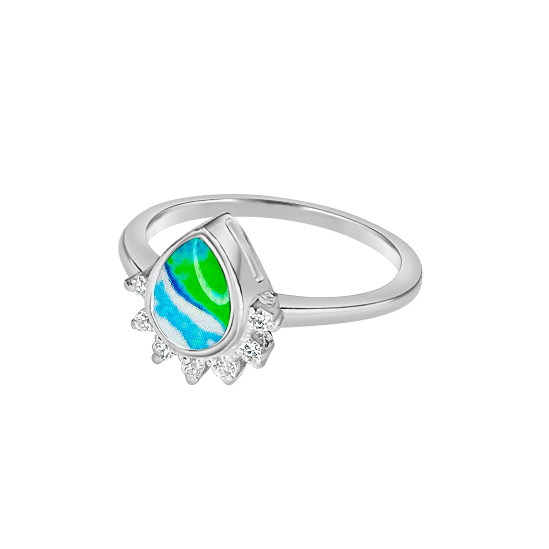 Sterling silver teardrop shaped ring with half halo of cubic zirconia stones and alzheimers cell image under resin pendant side view