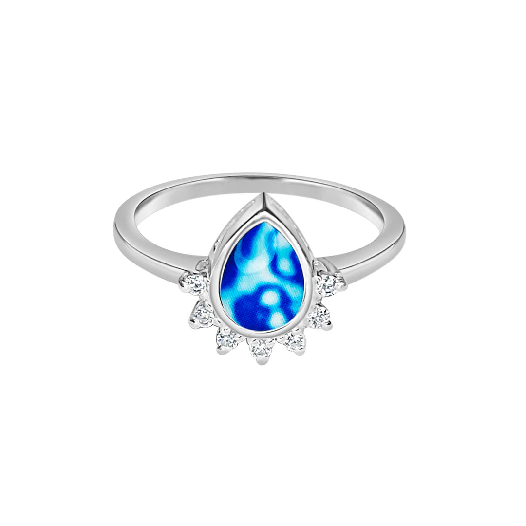 Sterling silver teardrop shaped ring with half halo of cubic zirconia stones and childhood cancer cell image under resin pendant