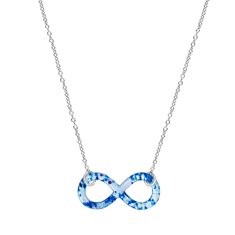 close up of infinity symbol necklace based on a colon cancer cell image in resin with Sterling silver chain 