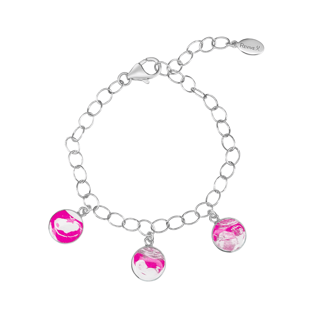 Silver bracelet with pink pendants showing with sonogram images on a white background