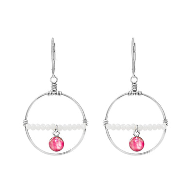 pink breast cancer pendants on a row of white crystal across sterling silver hoop earrings for awareness