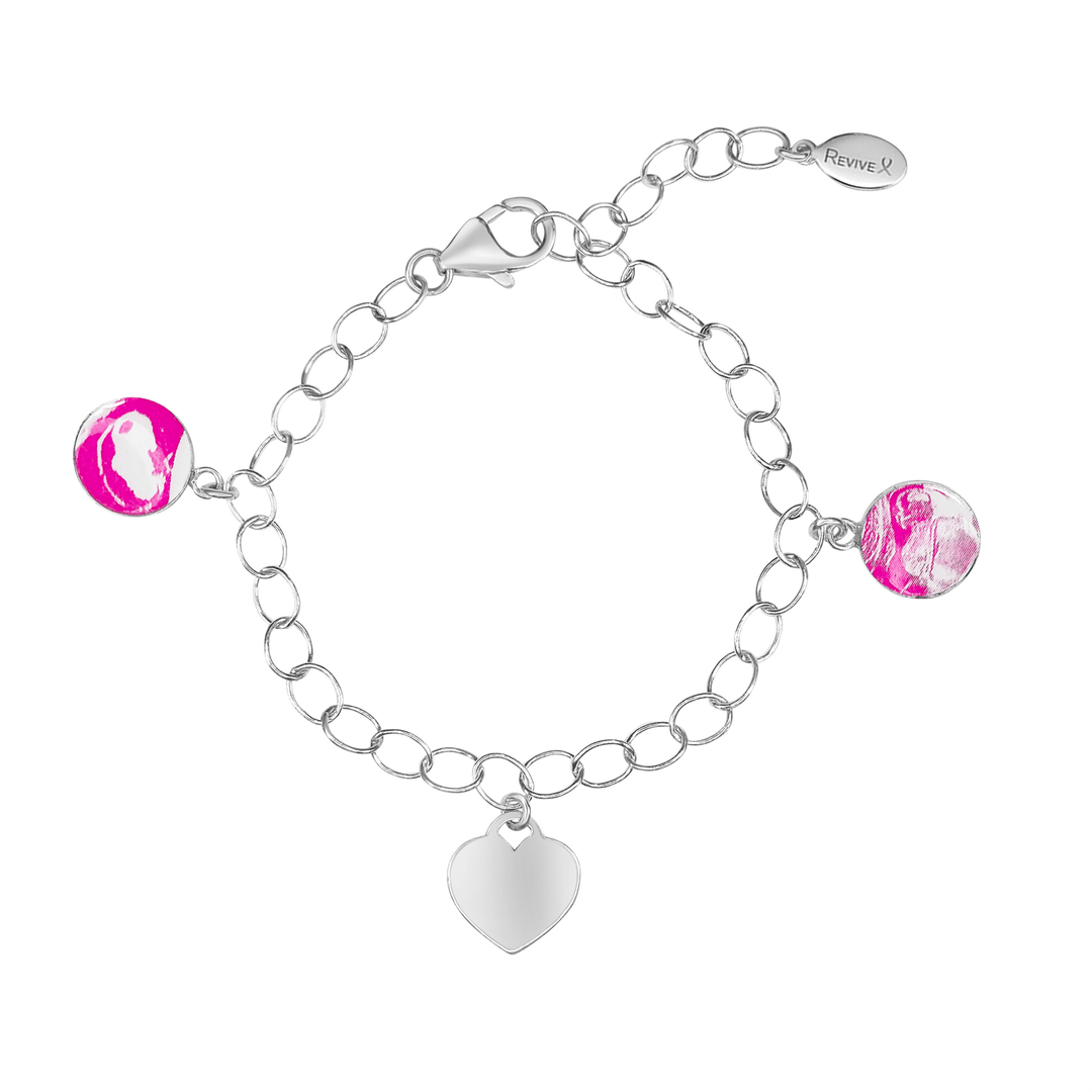 Silver bracelet with pink pendants showing sonogram images and an engraveable heart-shaped charm on a white background