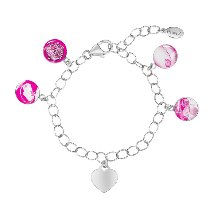 Silver bracelet with pink pendants showing the IVF journey from embryo to baby and an engravable heart-shaped charm on a white background