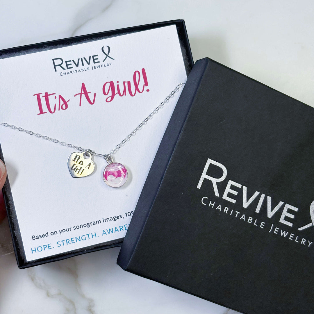 Silver Necklace with Pink Sonogram Image Pendant and "It's A Girl!" Heart-Shaped Engraved Charm in Product Packaging