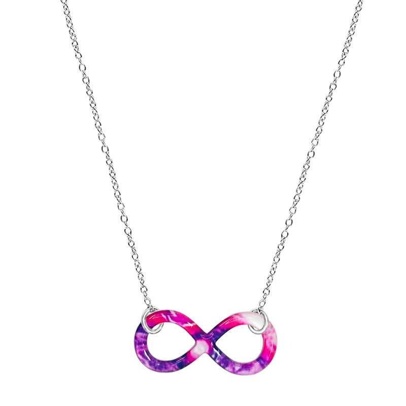 close up of infinity pendant necklace with lupus cell image in resin on Sterling silver  chain 