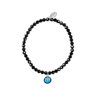 black spinel healing bead stretch bracelet with small round sterling silver pendant containing healthy human t-cell set in resin