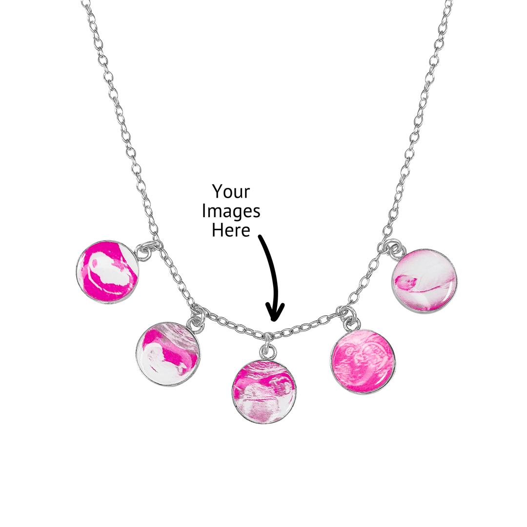 Silver necklace with 5 pink round pendants featuring sonogram and baby pictures