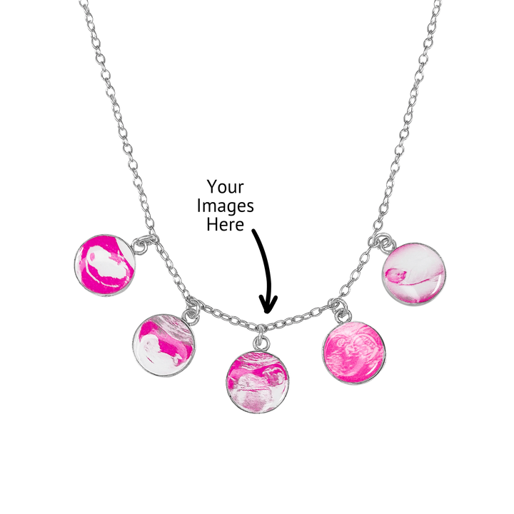 Silver necklace with 5 pink round pendants featuring sonogram and baby pictures