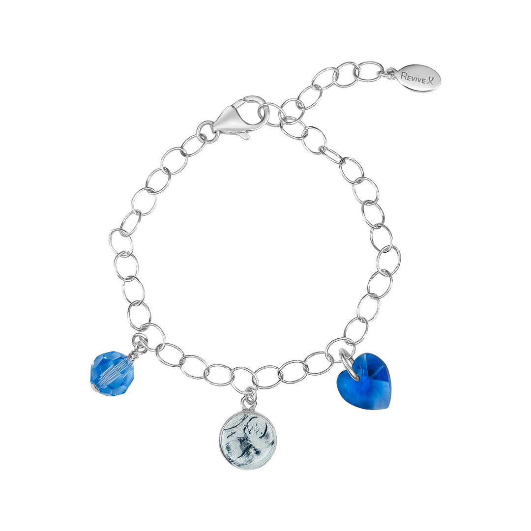 Silver bracelet with a grayscale sonogram pendant with blue birthstone crystals on a white background