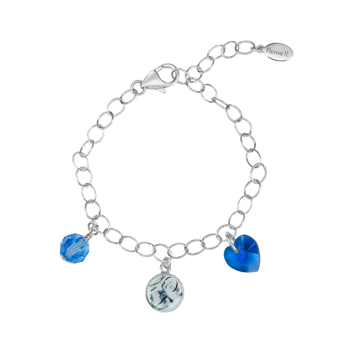 Silver bracelet with a grayscale sonogram pendant with blue birthstone crystals on a white background
