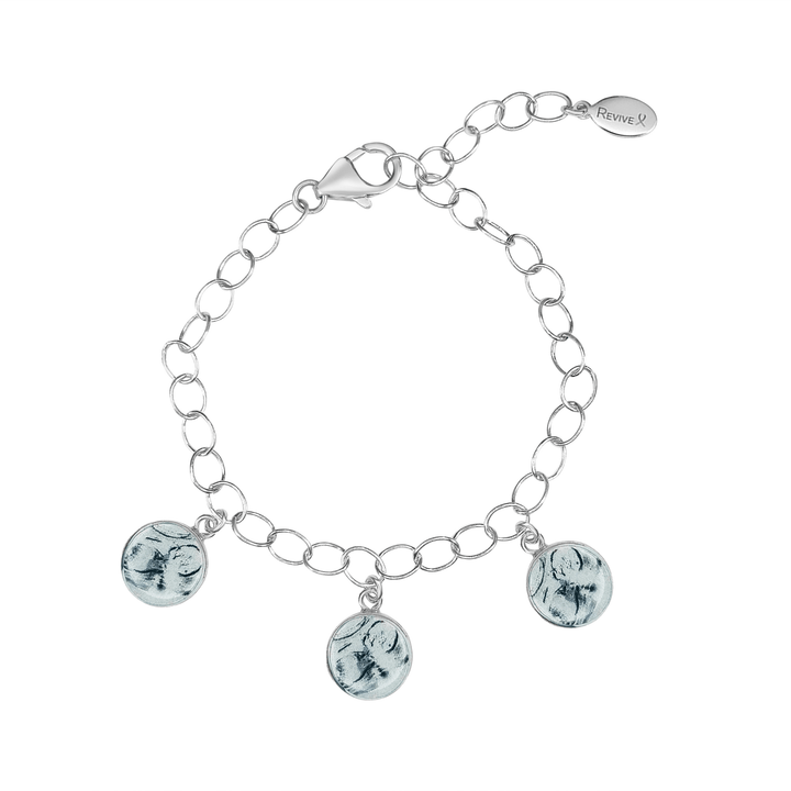 Silver bracelet with grayscale sonogram pendants on a white background