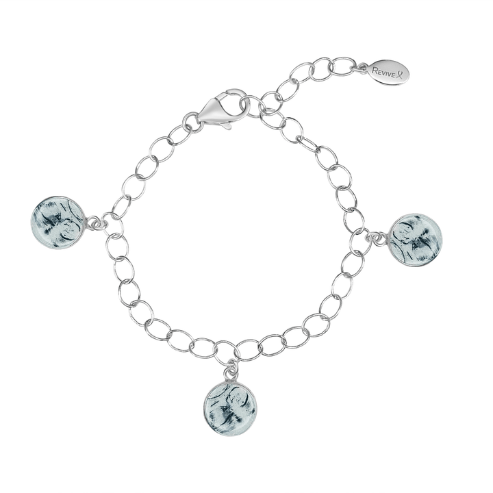 Silver bracelet with grayscale sonogram pendants on a white background