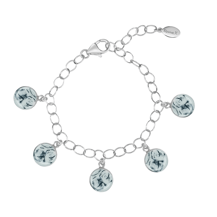 Silver bracelet with grayscale sonogram pendants on a white background