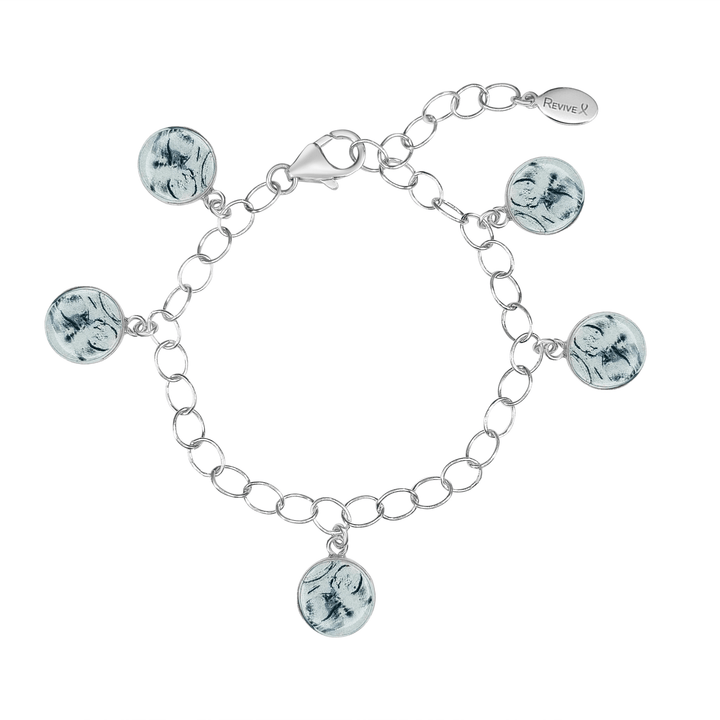 Silver bracelet with grayscale sonogram pendants on a white background