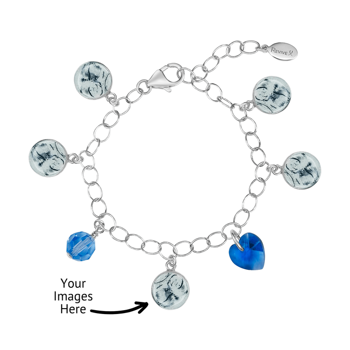 Silver bracelet with grayscale sonogram pendants with blue birthstone crystals on a white background