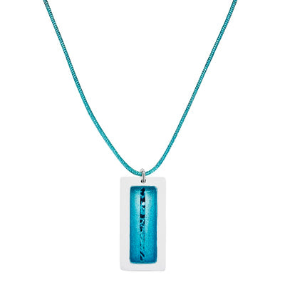 close up of rectangle pendant for ovarian cancer with white wooden frame and teal sparkly resin with thin cell image on teal adjustable cord