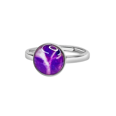 side view of round ring for pancreatic cancer awareness with purple cell image under resin and adjustable Sterling silver band
