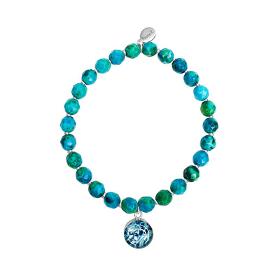 stretch ovarian cancer bracelet with teal azurite stones and small Sterling silver beads with round pendant that contains an ovarian cancer cell image in resin
