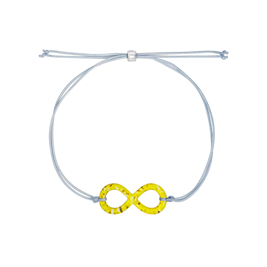 infinity pendant necklace with sarcoma cell image in resin on adjustable gray cord with Sterling silver slide bead 