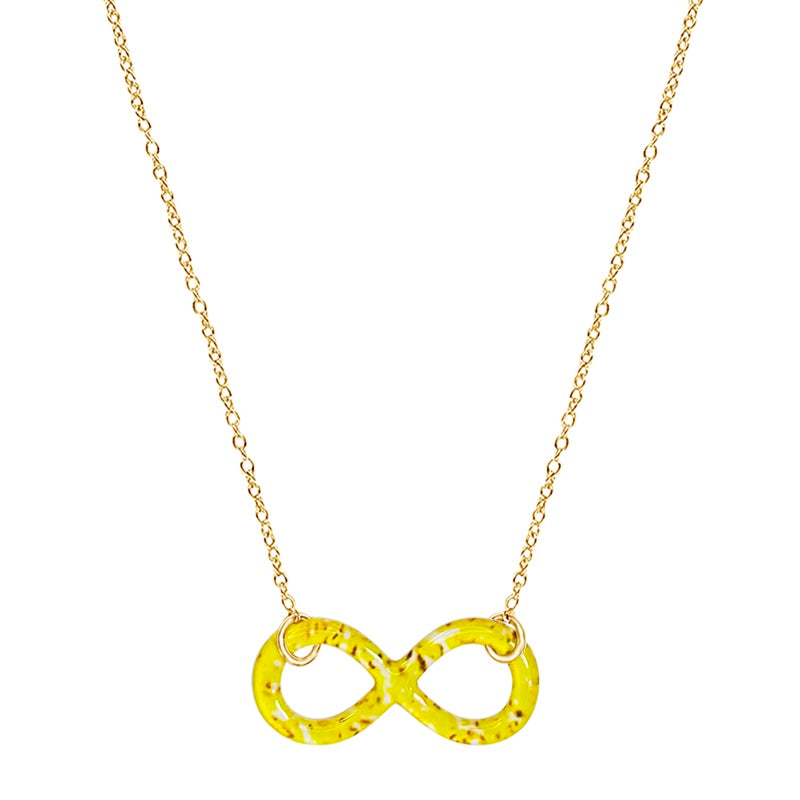 close up of infinity pendant necklace with sarcoma cell image in resin on gold filled adjustable chain 