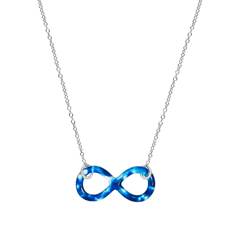 close up of childhood cancer cell image infinity symbol pendant with resin and Sterling silver chain necklace