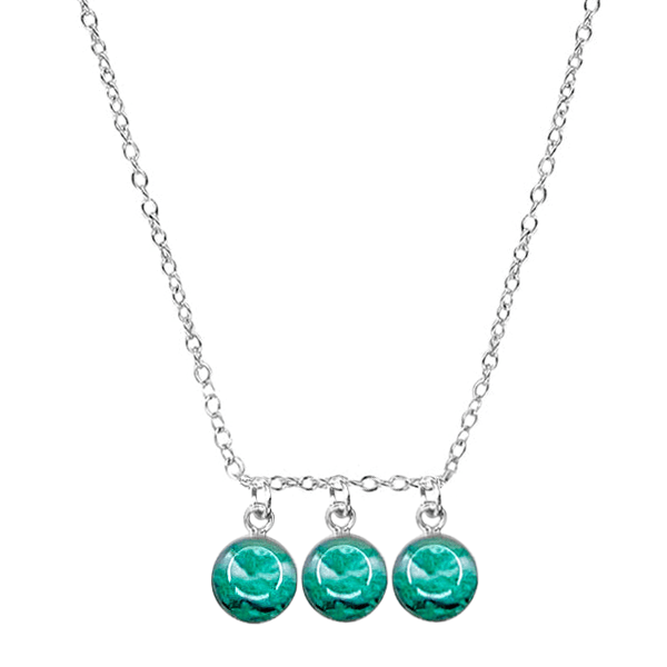 close up of custom fertility necklace in sterling silver with 3 pendants