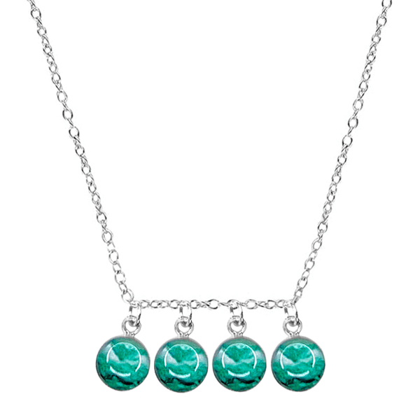 close up of custom fertility necklace in sterling silver with 4 pendants