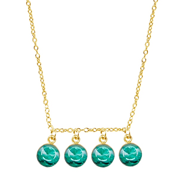 close up of custom fertility necklace in 14k gold filled with 4 pendants