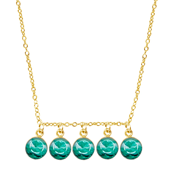 close up of custom fertility necklace in 14k gold filled with 5 pendants