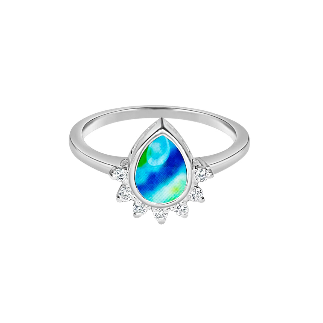 Sterling silver teardrop shaped ring with half halo of cubic zirconia stones and diabetes cell image under resin pendant