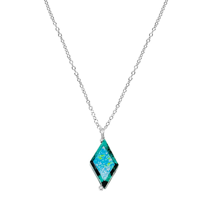 close up of diamond shaped african turquoise stone pendant necklace on sterling silver chain featuring Alzheimer's cell image in resin