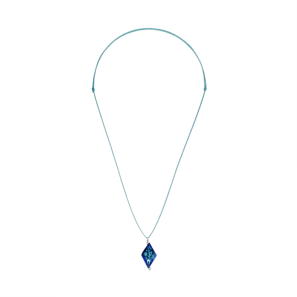 diamond shaped dark blue lapis stone pendant necklace on teal cord featuring ovarian cancer cell image in resin