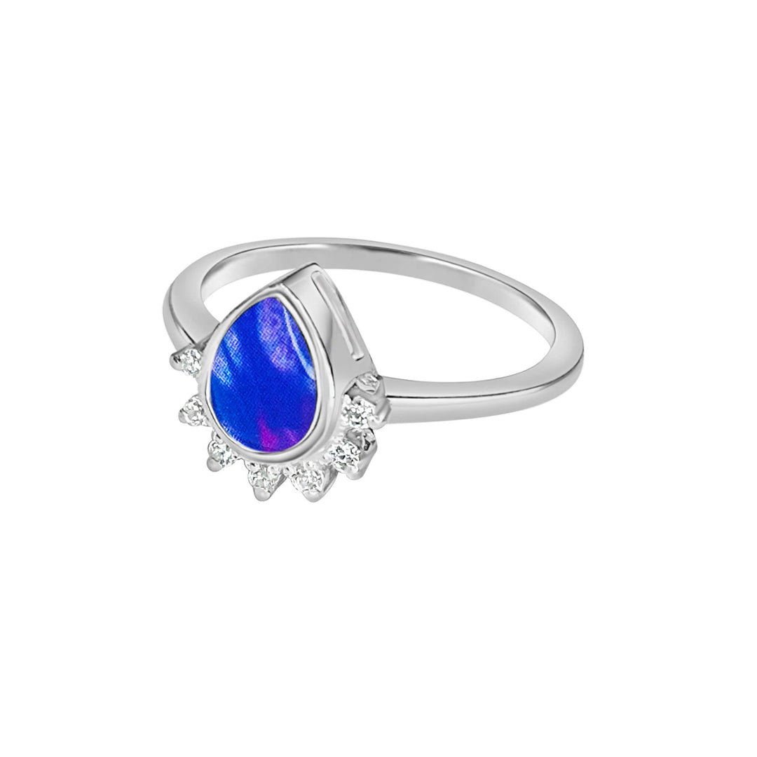 Sterling silver teardrop shaped ring with half halo of cubic zirconia stones and lung cancer cell image under resin pendant side view