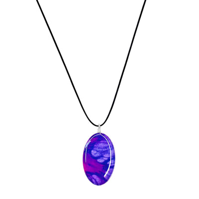 close up of purple lung cancer necklace with oval cell image resin pendant on adjustable black cord