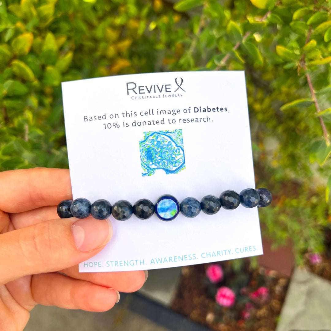 men's jewelry duoderiorite bracelet for awareness with stretch cord and diabetes cell image in resin on product packaging card