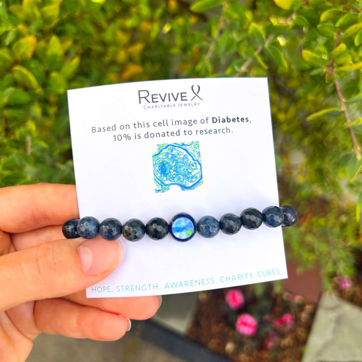 men's jewelry duoderiorite bracelet for awareness with stretch cord and diabetes cell image in resin on product packaging card