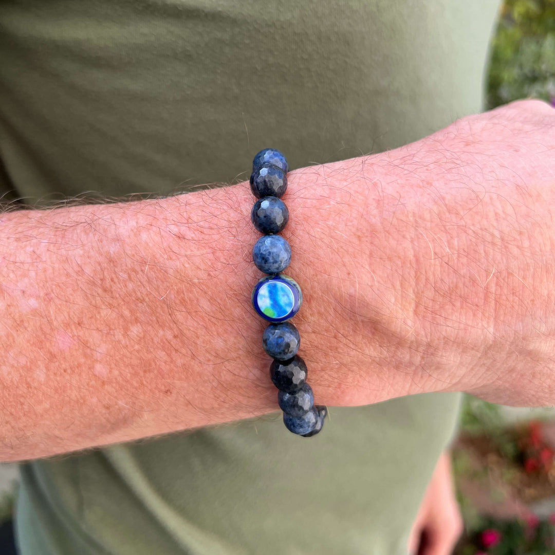 close up of mens jewelry duometeorite stretch bracelet with diabetes cell image in resin pendant on model