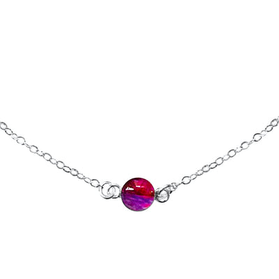 Heart disease necklace with 6mm round red and purple pendant with heart disease cell image in resin on sterling silver chain.