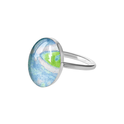 Embrace ring for Alzheimer's awareness in sterling silver with lime green and blue pendant. 