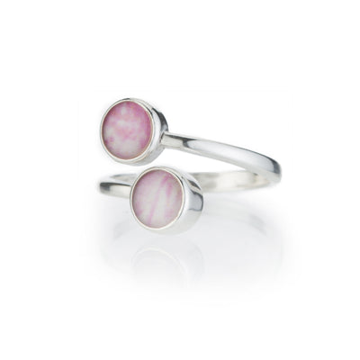 Breast Cancer Rings in sterling silver with two pink and white breast cancer histology slides under resin.