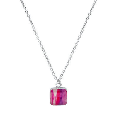 close up of square purple, pink & white pendant chain necklace for lupus awareness gives back to research
