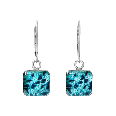 Sterling silver square earrings with teal ovarian cancer cell images under resin on secure lever backs
