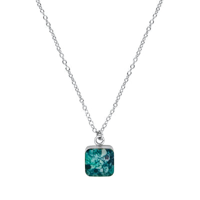 Close up of square Ovarian Cancer Necklace with  teal pendant and sterling silver chain.