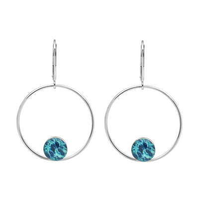  Unity ovarian cancer hoop earrings in sterling silver with circular pendants of a cancer cell image under resin. 