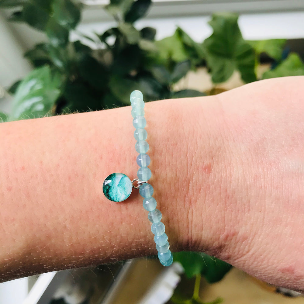 custom infertility awareness stretch bracelet on model